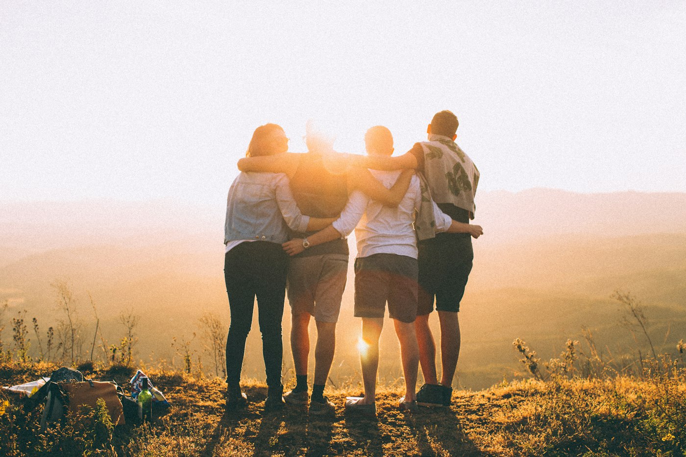 Friends enjoying the outdoors at sunset